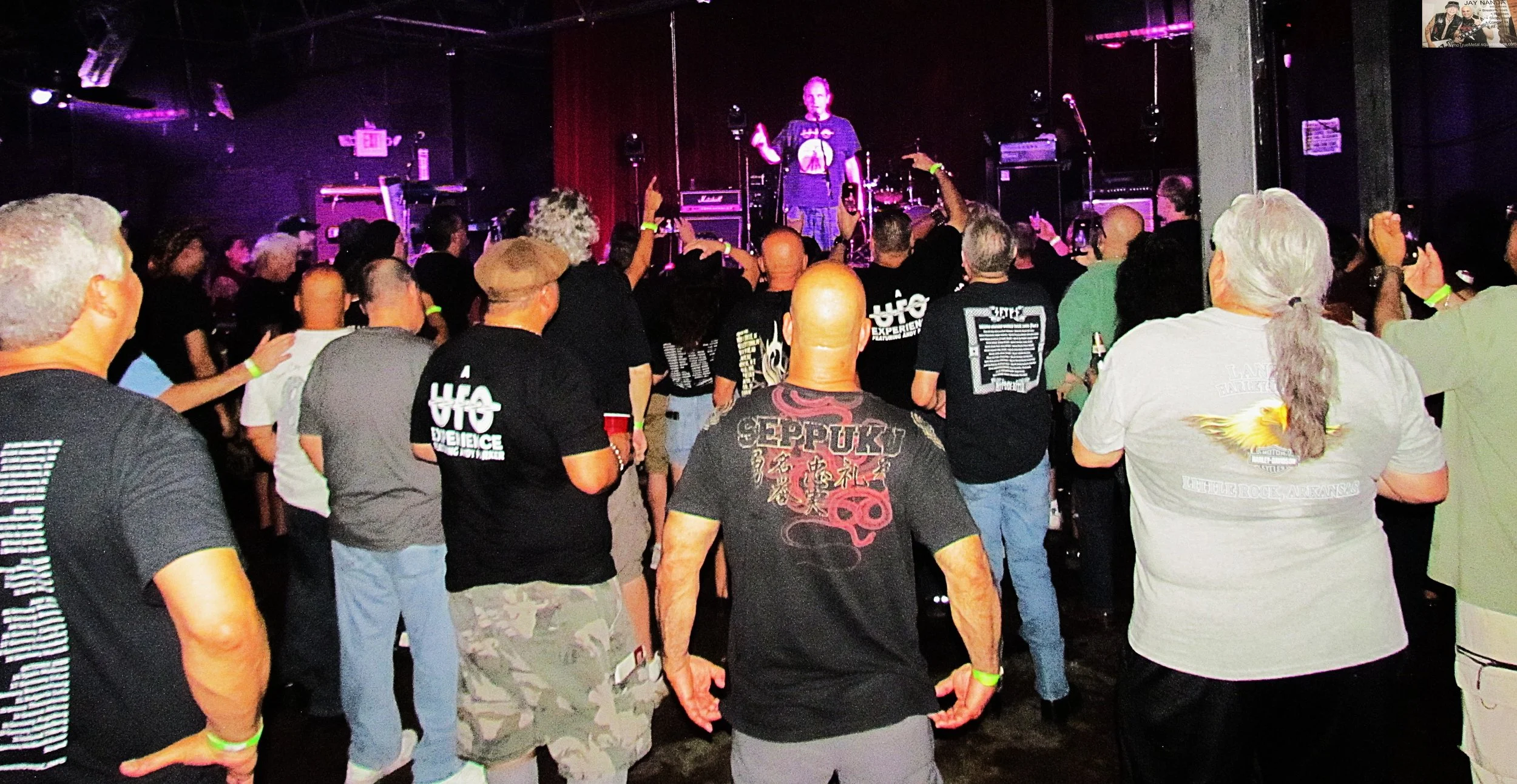  Trunk (center) tells the audience they had “one more classic you still haven’t heard” before the group’s lone encore “Shoot Shoot.” 