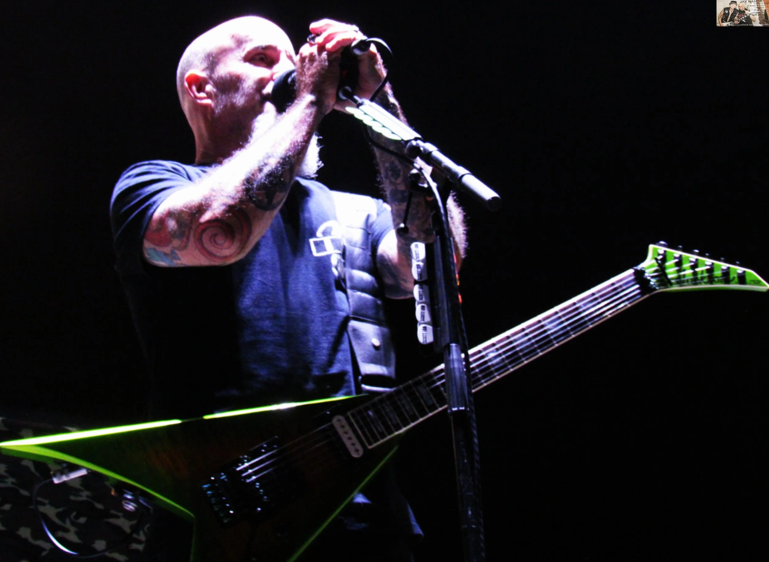  Ian explains to the 50,000-plus fans that Benante was too ill to play the show and that Mike Heller was kind enough to fill in.  