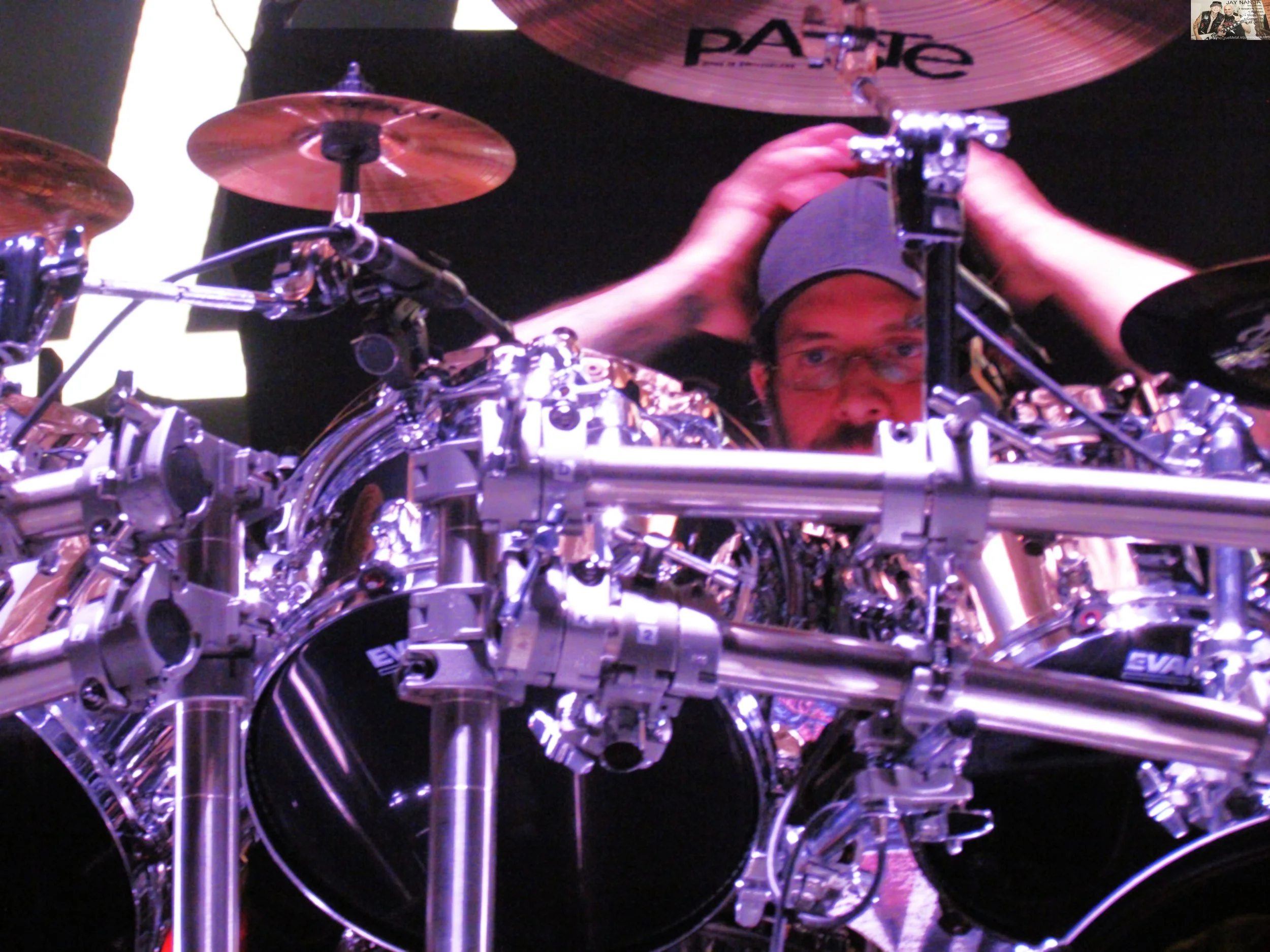  Heller is overcome with a range of emotions and thoughts as he sits behind the kit despite not knowing any of the band’s tunes and having to chart them out with the rest of the group only an hour before going on stage.  