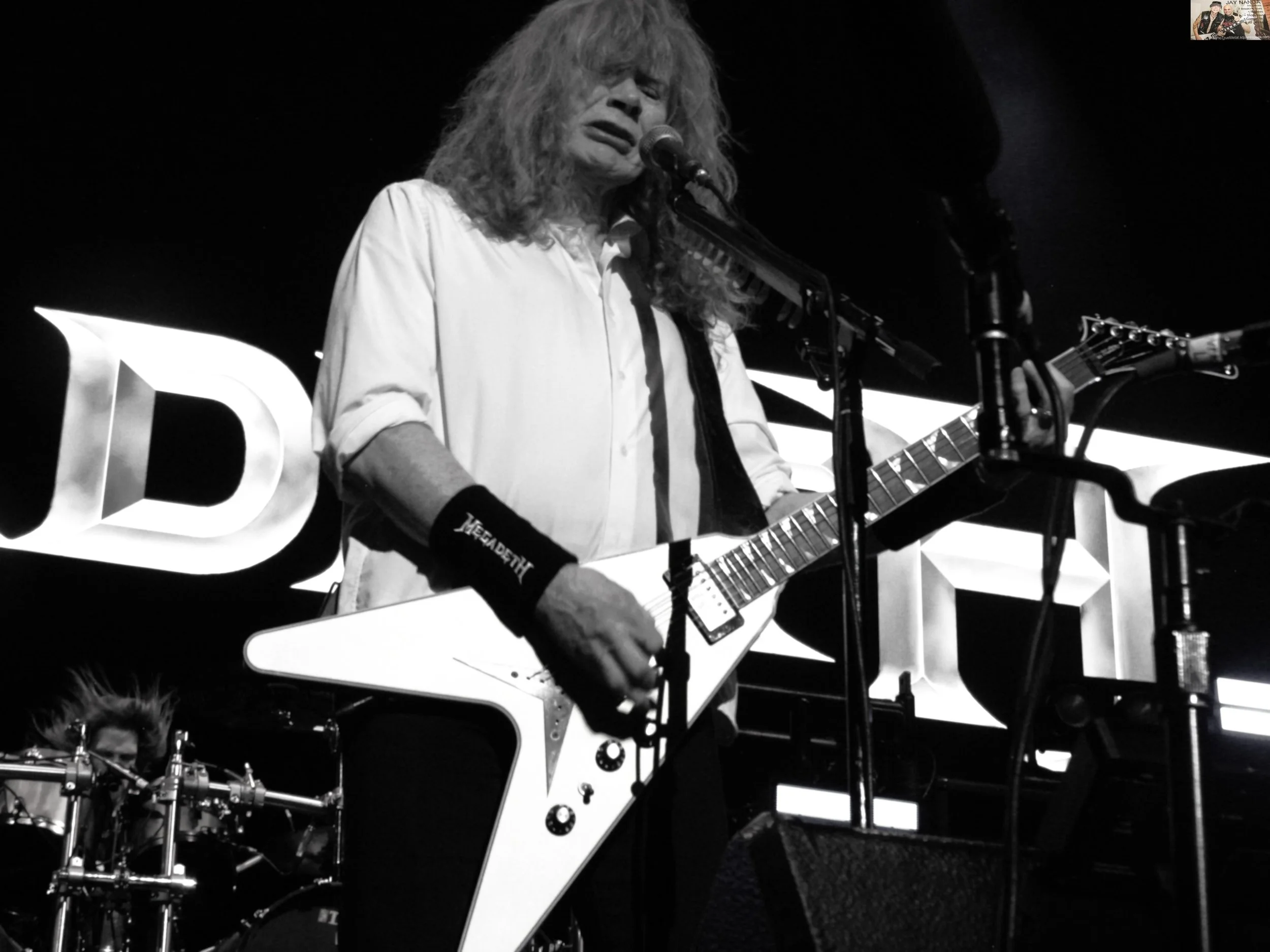 Mustaine, a Flying-V and his patented snarl are synonymous with metal.  