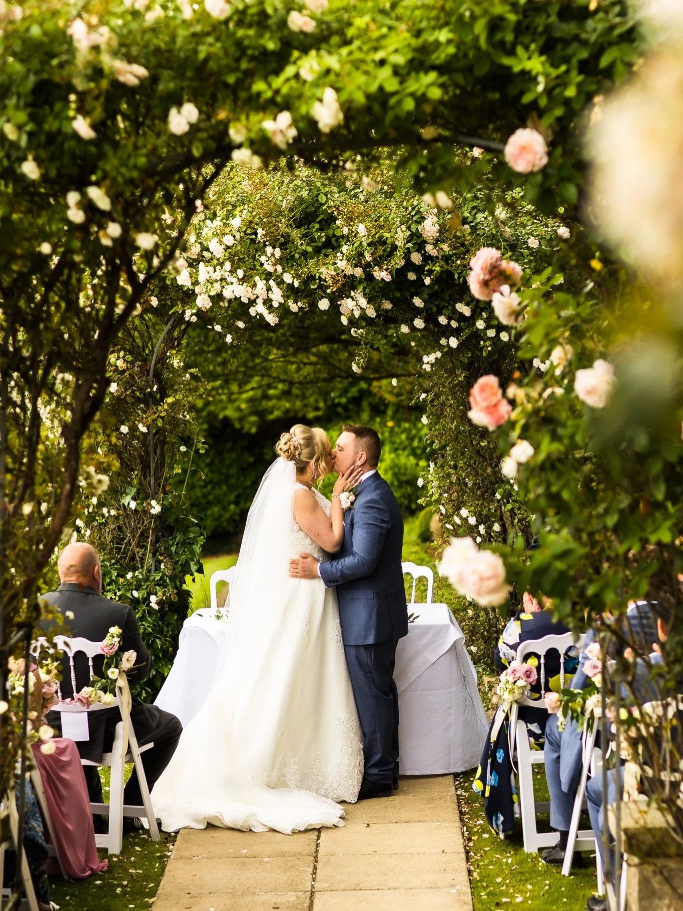 Trying to remember what it felt like when it was warm enough to have a ceremony outside! We&rsquo;re so lucky in Yorkshire to have so many gorgeous venues that host outdoor wedding ceremonies and the rose garden at @woodhallhotel is so glorious! Thro