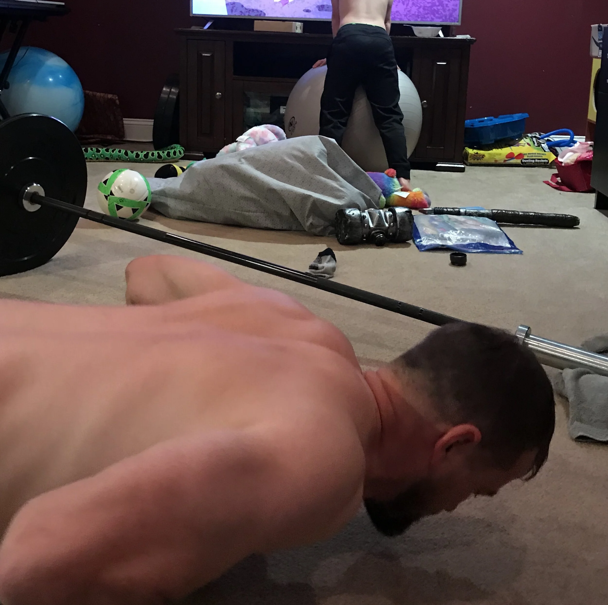 Our home workout space, shown as a complete mess in this photo. Did you read part 1 ? I know from experience!