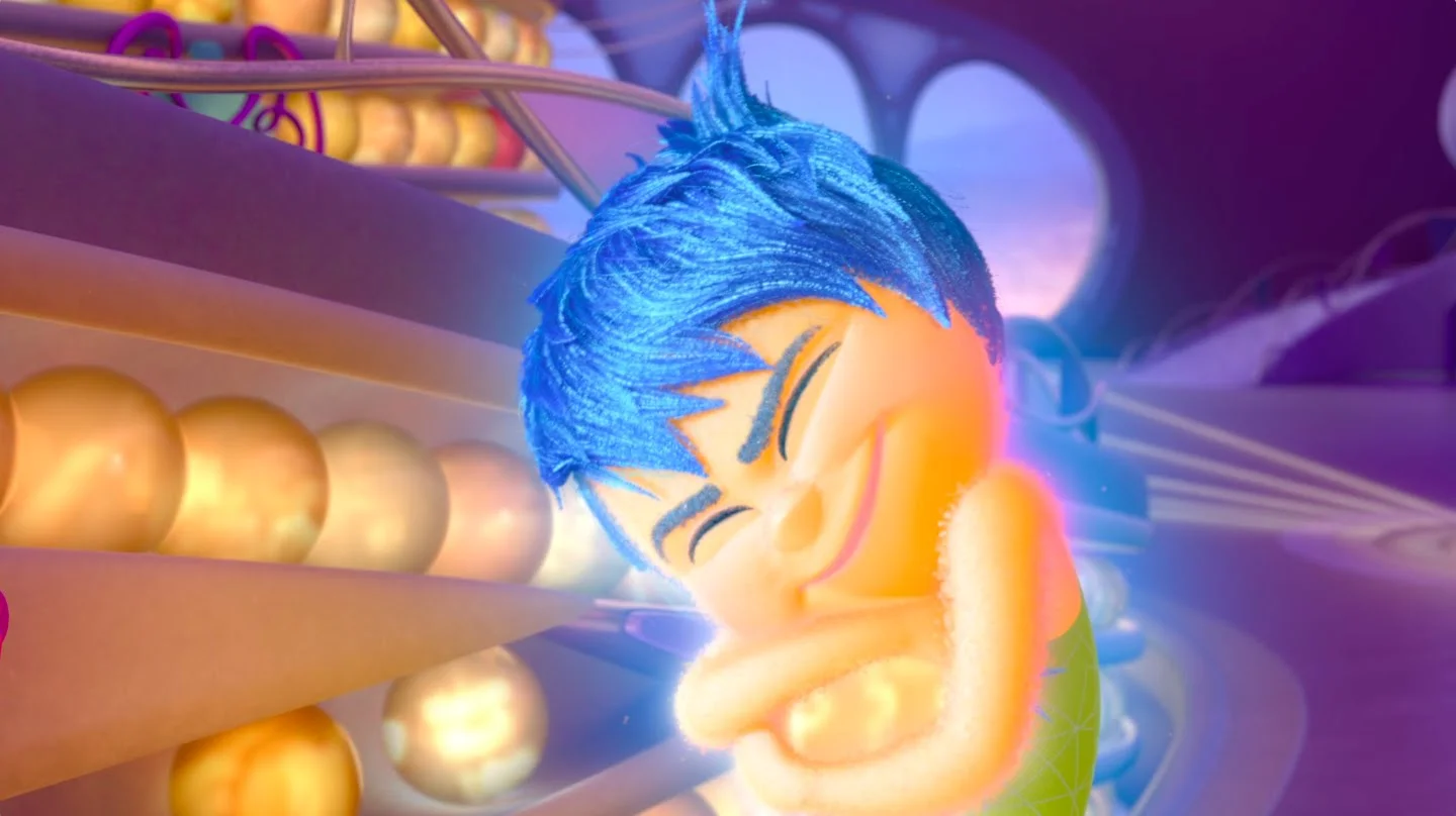 Joy holds tightly to a core memory in "Inside Out."