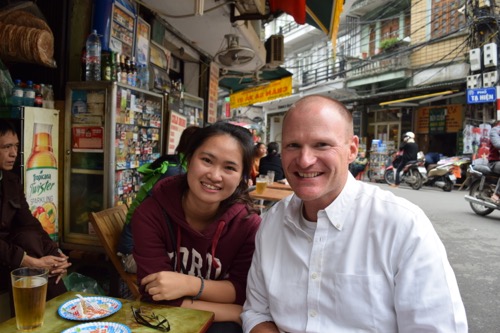 Cherry and Jake sitting on Beer Corner in Hanoi, Vietnam.
