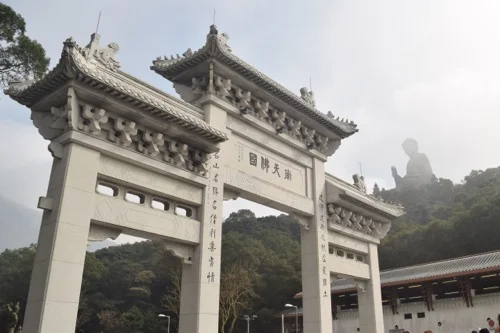 You can see the Buddha in the background, high up on the hill.