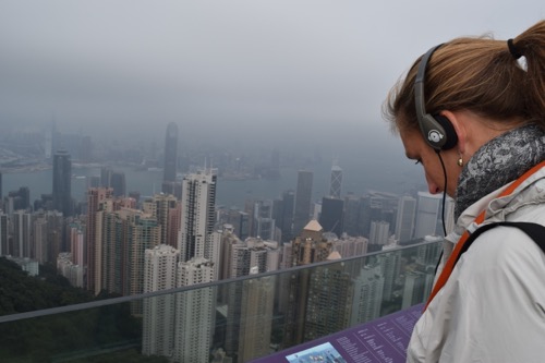 Jesslyn is intensely learning about HK with the central district in the background and Kowloon just visible across the harbor.