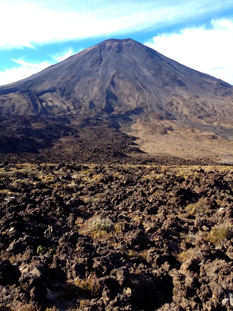 This volcano is Mount Ngauruhoe, or better known as Mt. Doom from the Lord of the Rings.&nbsp; I had never seen the volcanic rock like that before.