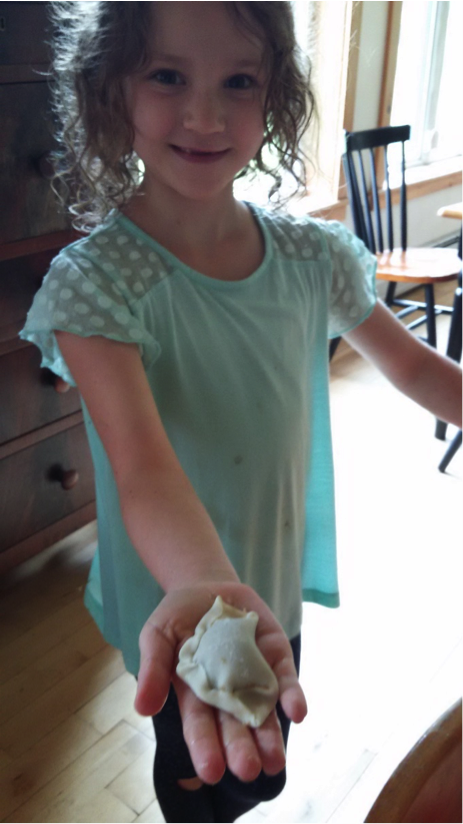 Kai with dumpling.png