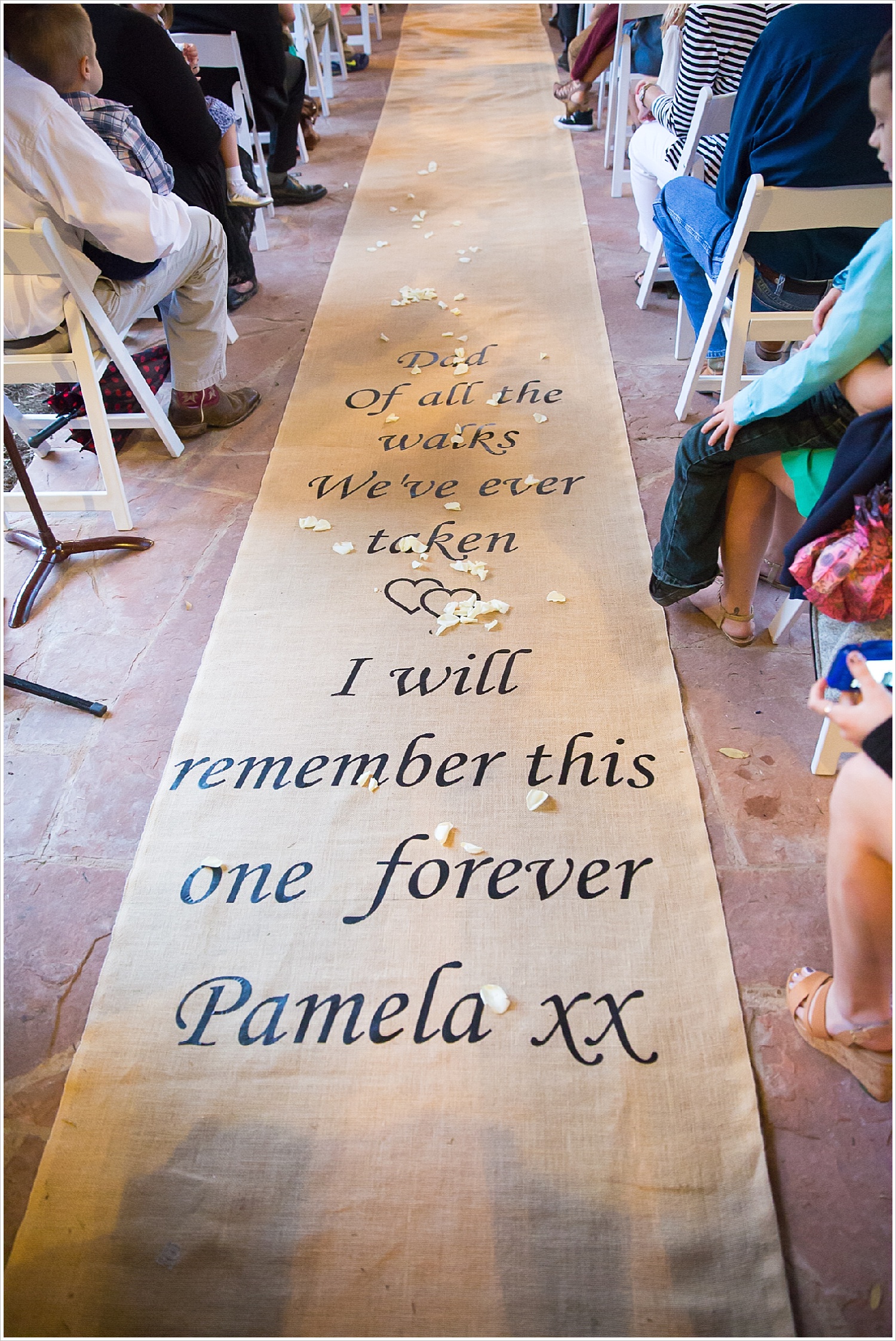 Aisle runner which says, "Dad, of all the walks we've taken, I will remember this one forever"