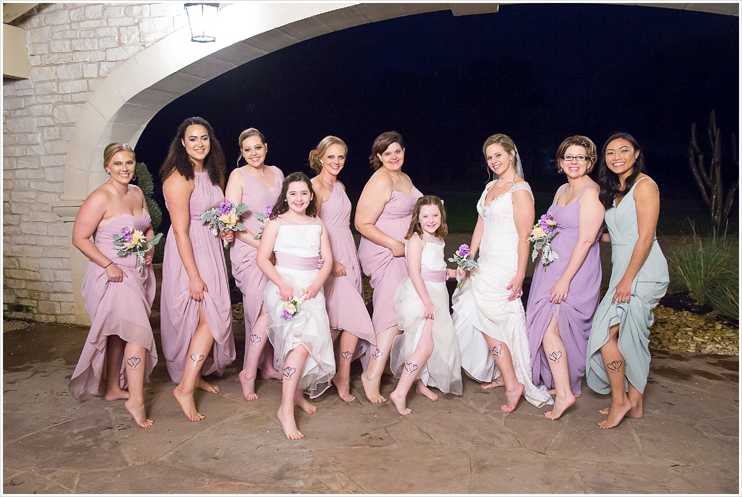 Bride and bridesmaids show off matching temporary tattoos