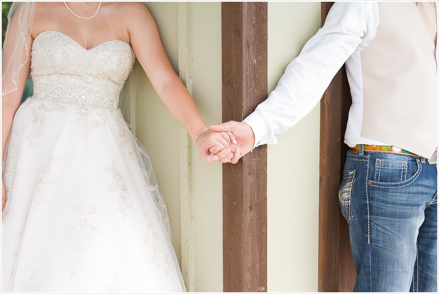 A bride and groom hold hands during a first touch, Carleen Bright Arboretum, Woodway, Texas