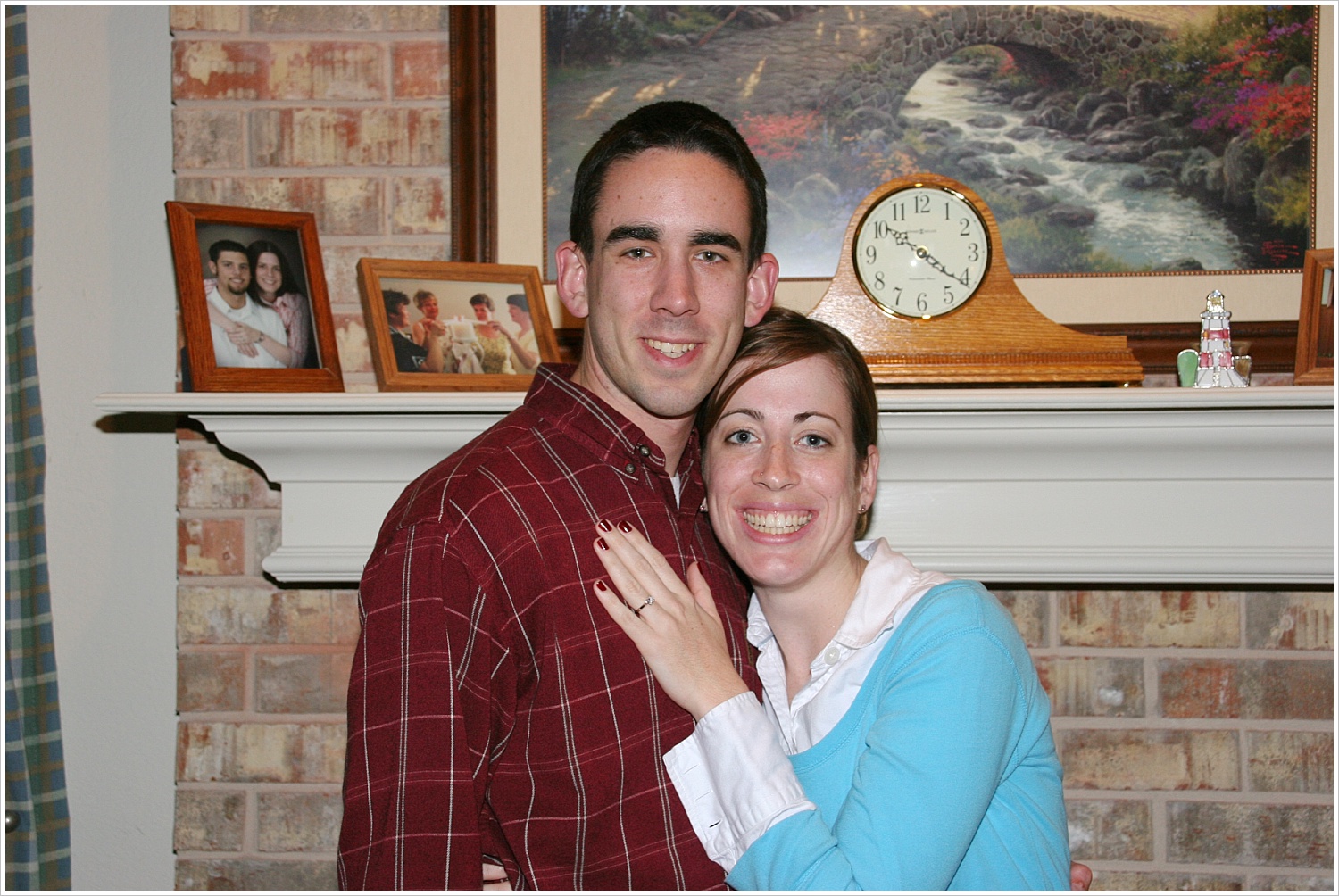 Obligatory pic taken by my mom in front of her fireplace the night we got engaged.