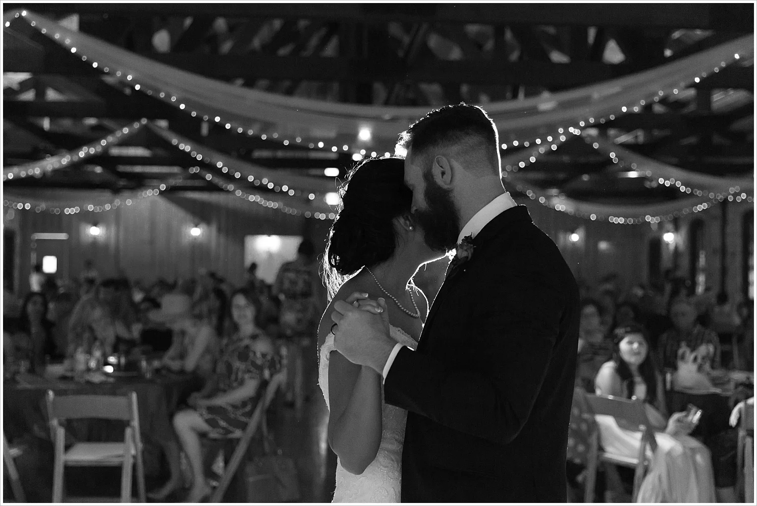 Black and white portrait of bride and groom's first dance, Bride and groom portraits, summer blush and navy wedding at Stone Hall at The Springs in McKinney, Texas, Jason & Melaina Photography, www.jasonandmelaina.com