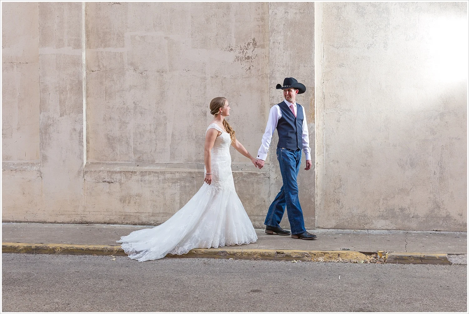 Bride and groom in downtown Waco, Navy and blush Texas Reception at The Phoenix Ballroom, Jason & Melaina Photography - www.jasonandmelaina.com