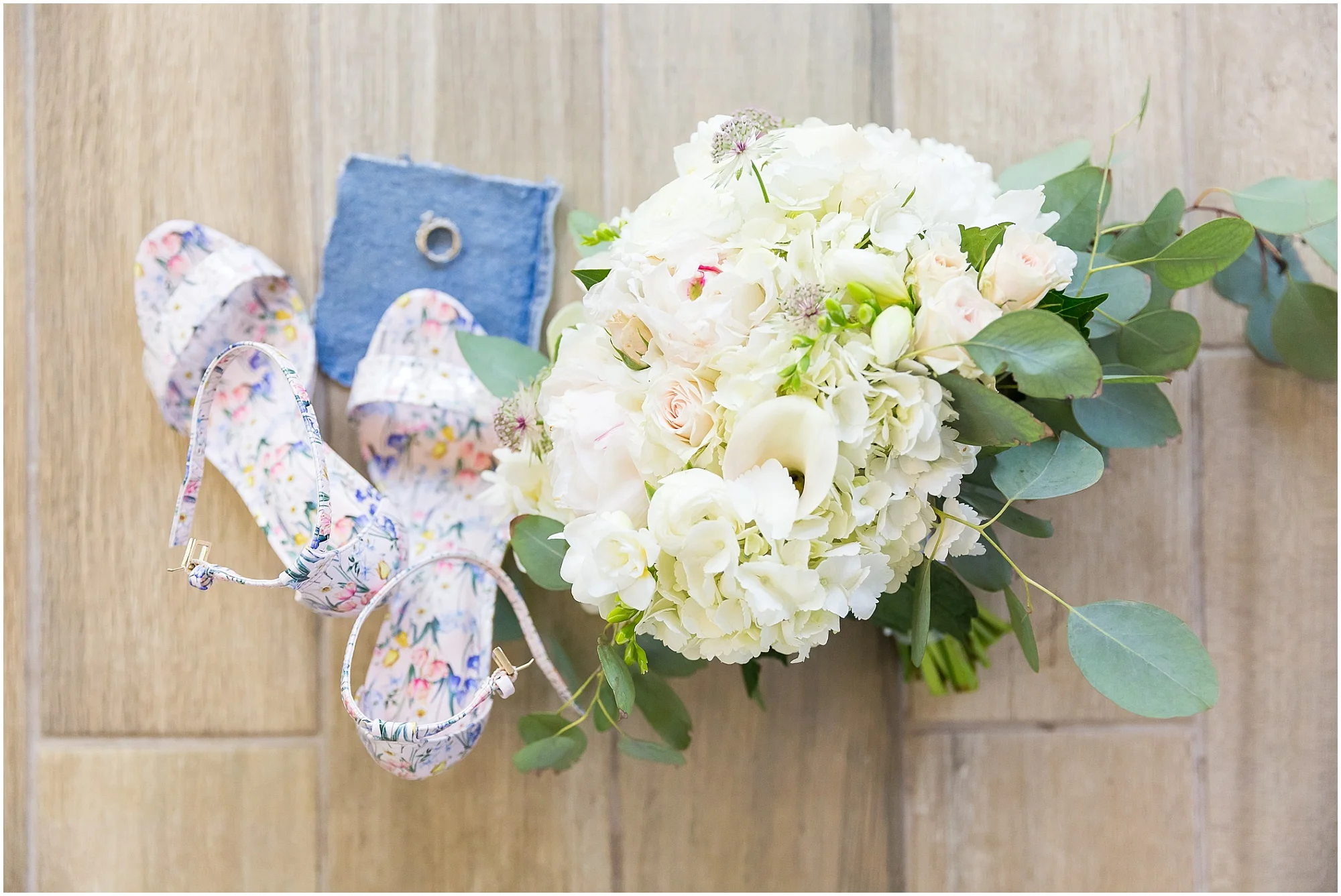 Bride's floral heels and bouquet at Fixer Upper house in Waco, Texas - www.jasonandmelaina.com