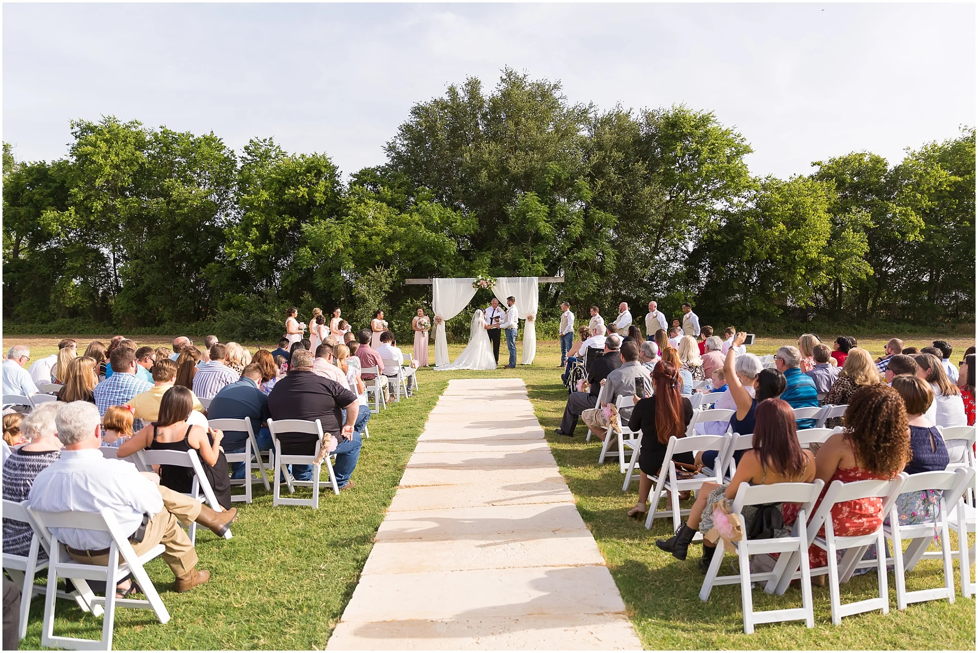 Ceremony site during an outdoor summer wedding at Rustic Acres in Belton, Texas - Jason & Melaina Photography - www.jasonandmelaina.com