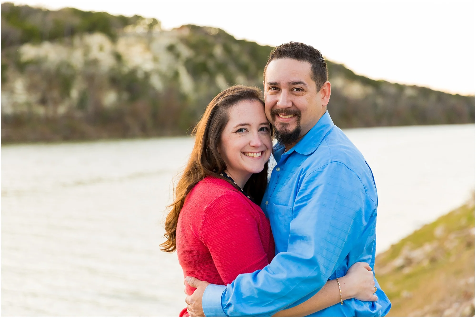 A couple smiles at the camera during their engagement photos in Cameron Park, Waco, Texas - Jason & Melaina Photography - www.jasonandmelaina.com