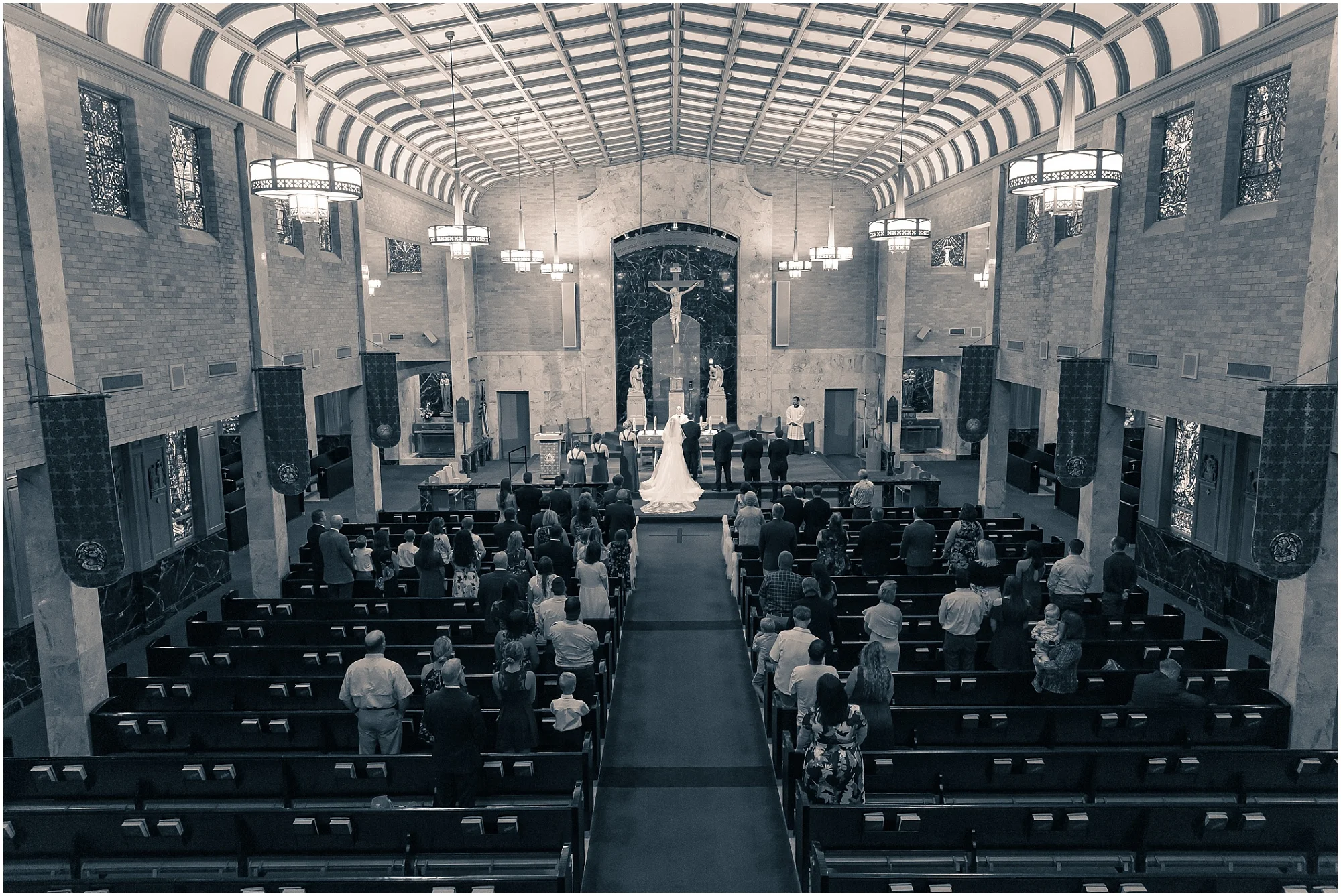 A traditional Catholic wedding ceremony inside St. Louis Catholic Church in Waco, Texas - Jason & Melaina Photography - www.jasonandmelaina.com