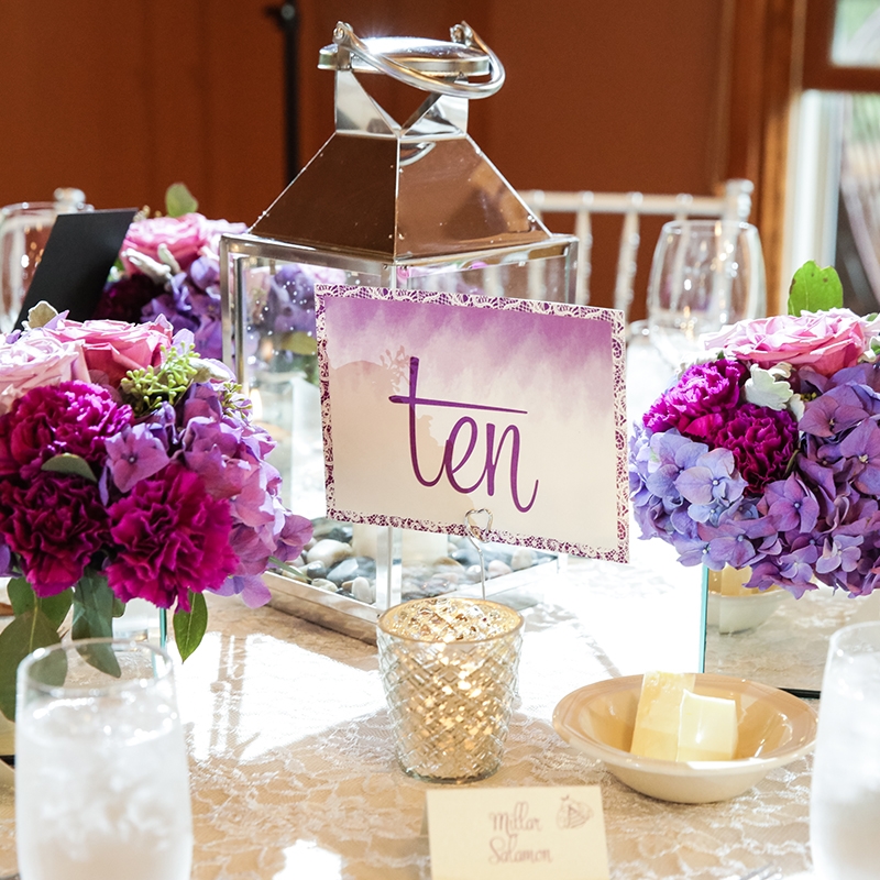 Pink Umbrella Designs - Wedding Table Number. Photo by Cassie's Camera