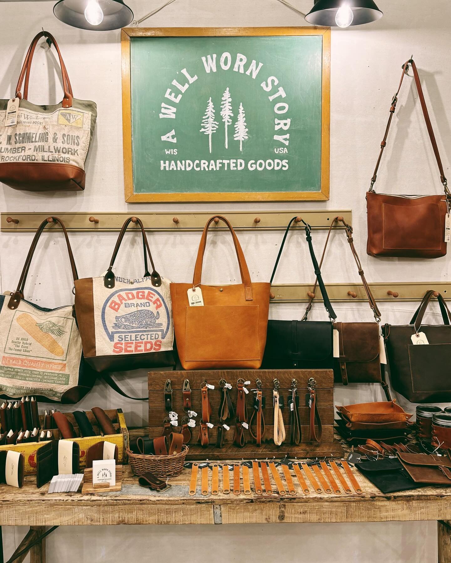 Our pop-up shop at @urban.farmgirl is ready to go for the Vintage Shop Hop this weekend! 

Our wall of leather goods in her shop features some of our best selling leather bags, wallets, keychains, AND the first few one-of-a-kind bags of the year made