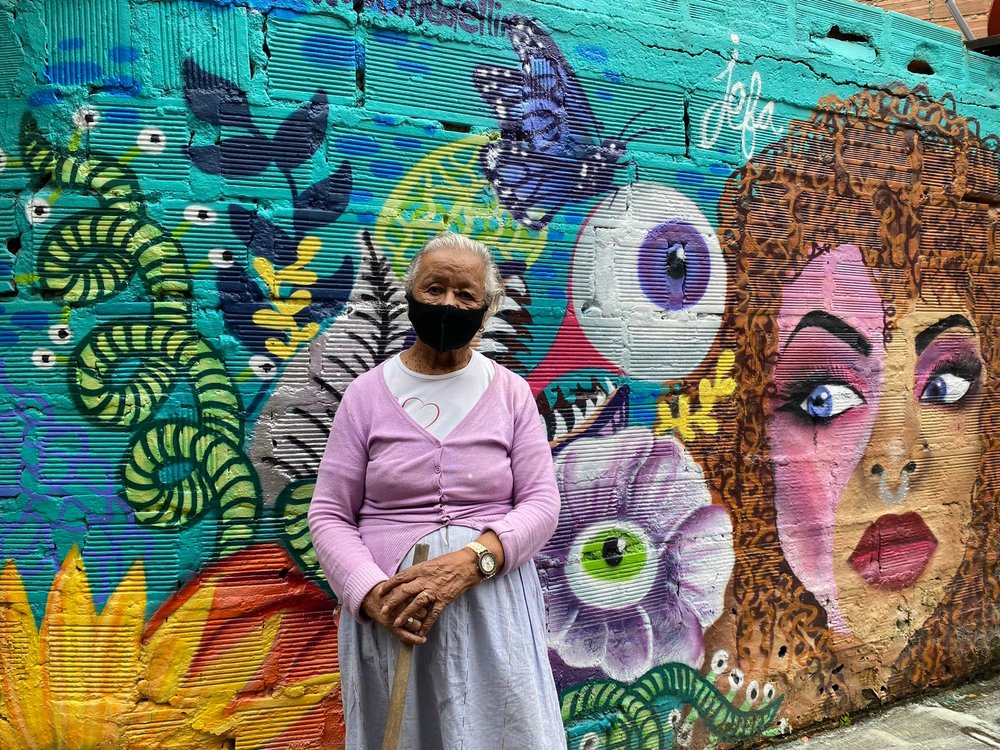  Rosa (I was not able to get her last name) has lived in the district all her life. I found her sweeping right outside her front door. She told me her neighborhood has changed a lot, in recent years for the better. Despite all the gains, the district