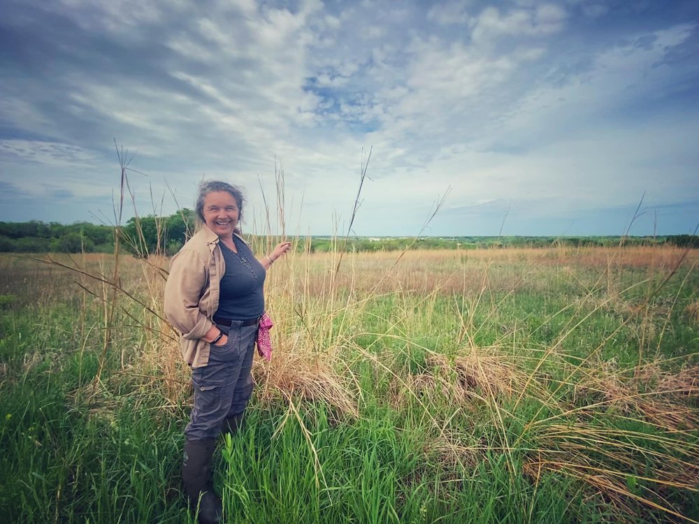  Linda demonstrates why it is called tallgrass prairie. 