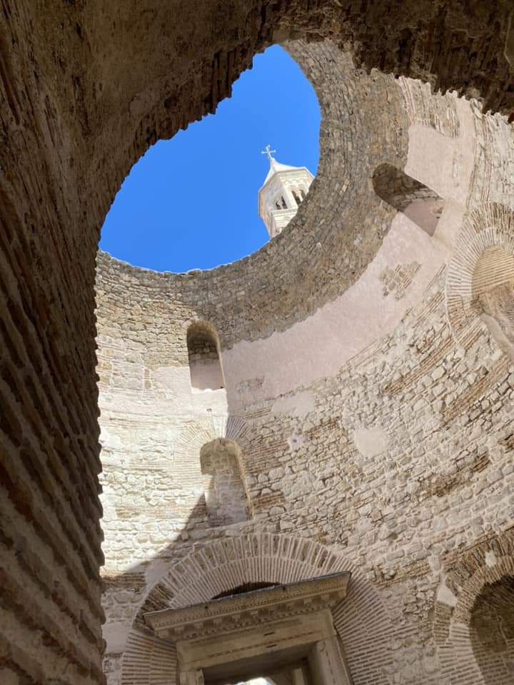  Roman vestibule with a later-built Romanesque church bell tower in the background. 