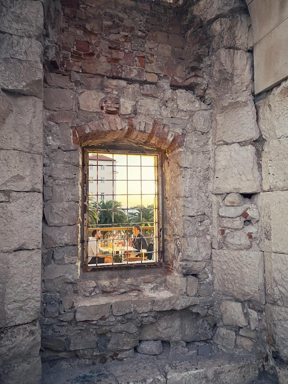  An example of the repurposing done over centuries of use: The Roman palace with its large arched windows was, during the Middle Ages, converted into smaller homes. Windows were made smaller and interior walls built. Today it’s a restaurant. 