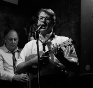 photo @Barney Bishop John Bianchi sings, plays clarinet, saxophones and uke, and writes original songs for the Quartet. 