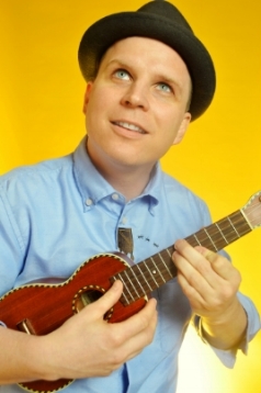 Ben Mealer sings and plays ukulele and percussion in the Quartet.