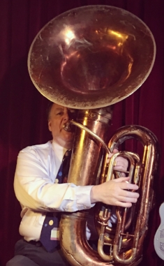 Brian Nalepka keeps the band moving on string bass, tuba and bass saxophone - and sings like a boid.