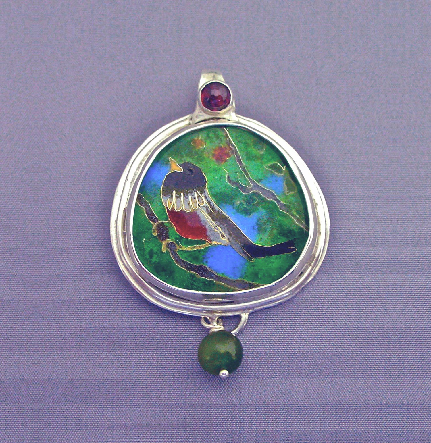 Small Bird in Tree, pendant. Gold, silver, enamel, garnet, tourmaline. 4.5 x 3.6 cm. $900