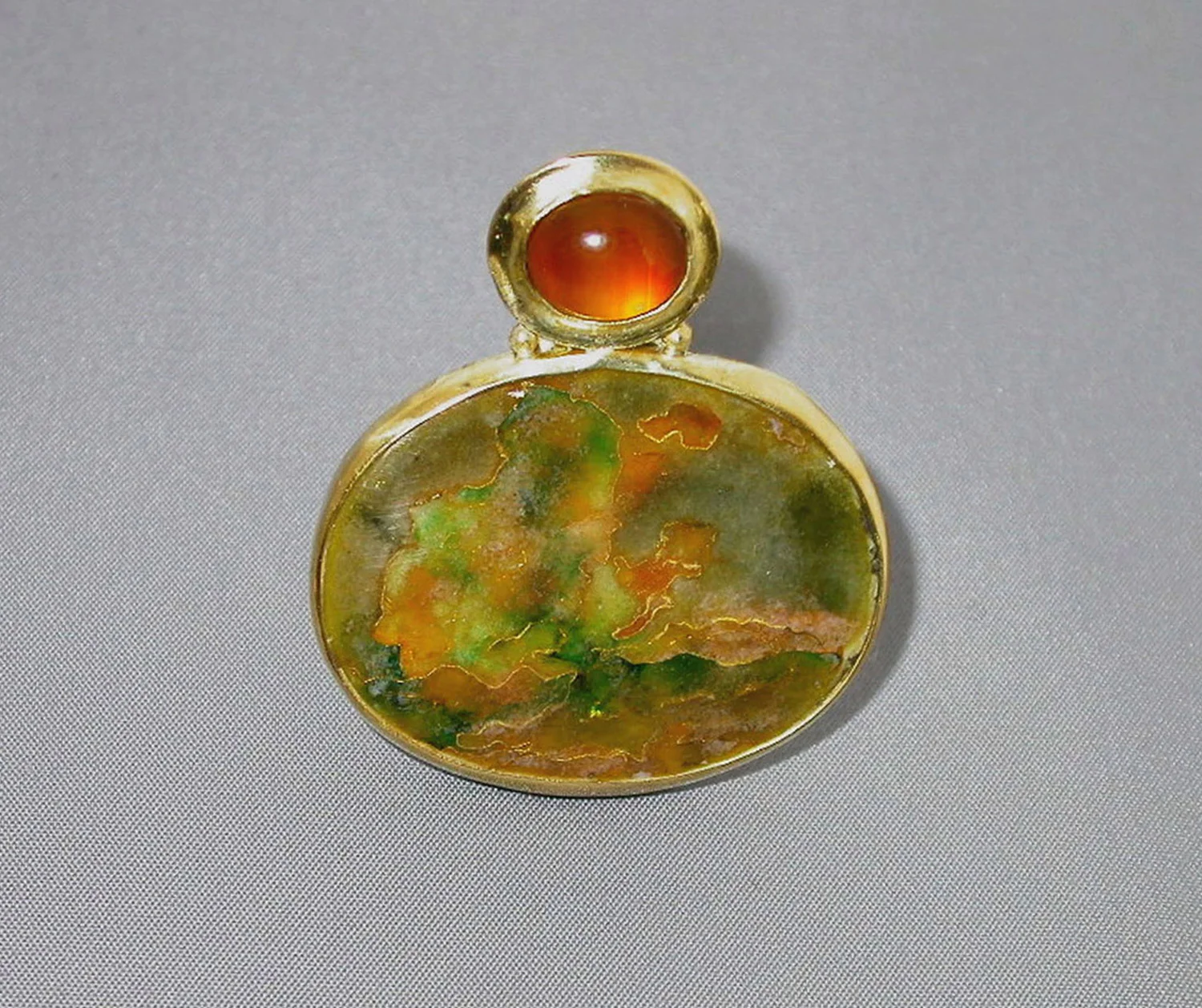Abstract Landscape, brooch. Gold, silver, enamel, citrine. 5 x 3.3 cm. $2000