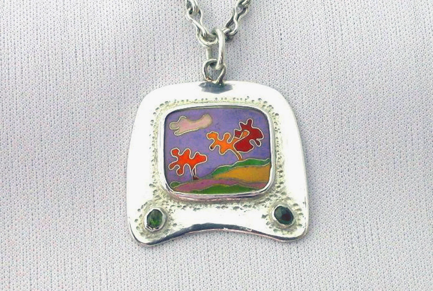 Gauguin Colored Landscape, pendant. Silver, enamel, tourmaline. 3.8 x 3.2 cm. $600
