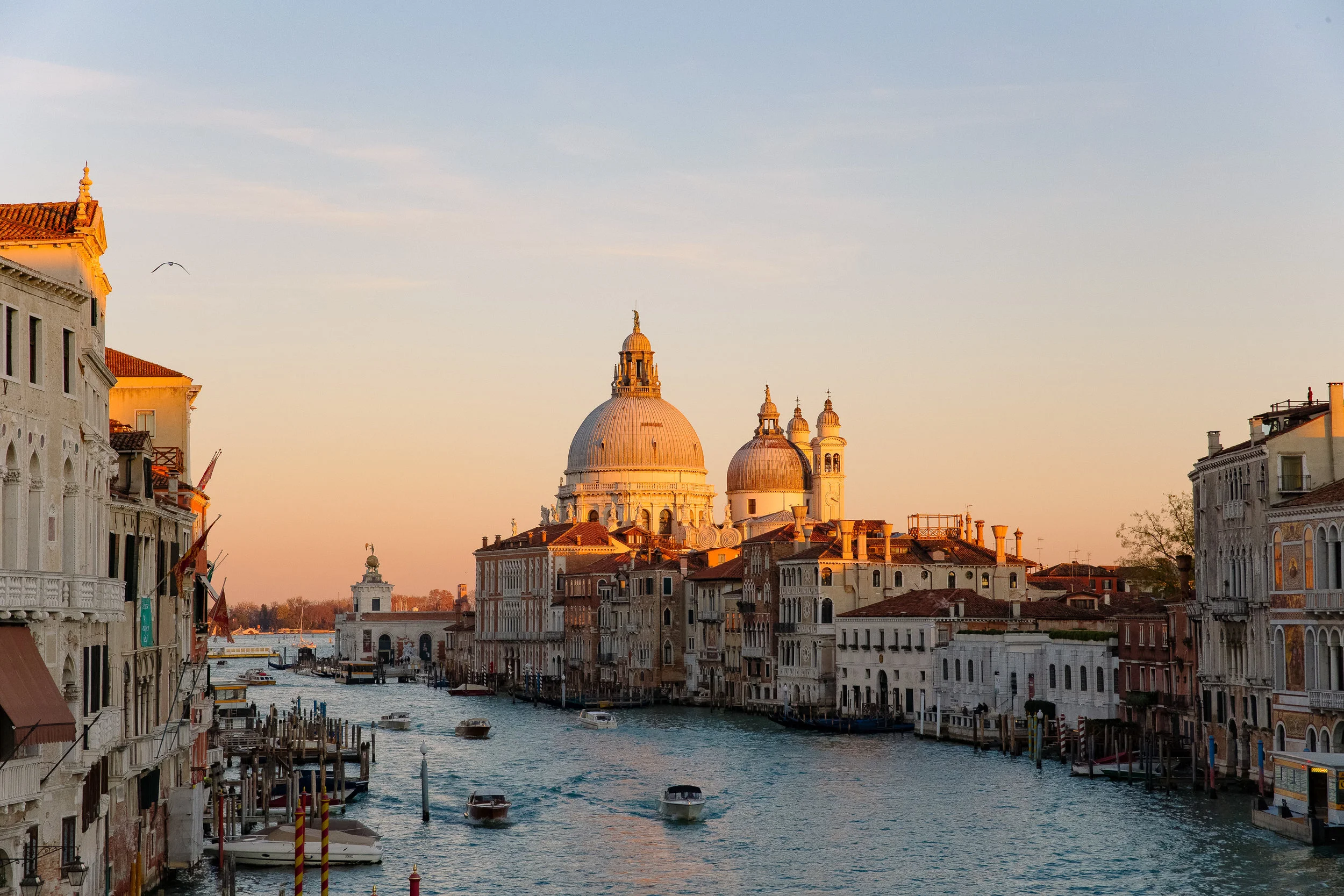 Venice - Speaking of Venice…When we went to Venice, I really thought it would end up being in a sort of Italian Disney World- being heavily warned about all the tourists. I was completely wrong and absolutely loved it. We also went in low season which was perfect. We had St. Marks Square basically all to ourselves. It is such a fun city to wander and eat Cicchetti ( Apertivo in Venice). We drank a ton of wine and stumbled around enjoying the sites and sounds of Venice. We did do a Gondola ride to check that off the list, and honestly it was the only real let down of Venice. It was 30 minutes but felt like 5 minutes and we paid like 90 Euros- we got super ripped off. Next time I would love to rent a boat. We took a boat to the airport at 5am and it was one of the most fun experiences ever- the boat literally docked at the airport entrance!