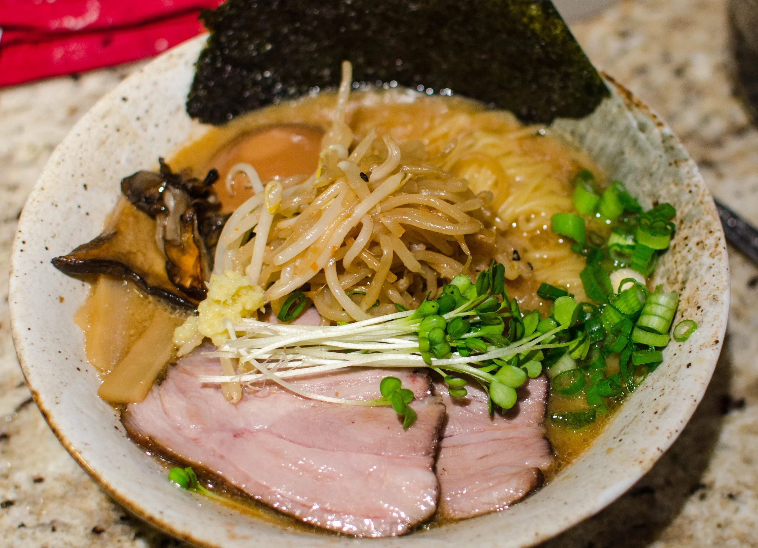 a busy bowl of miso ramen. i am guilty of adding too many ingredients.