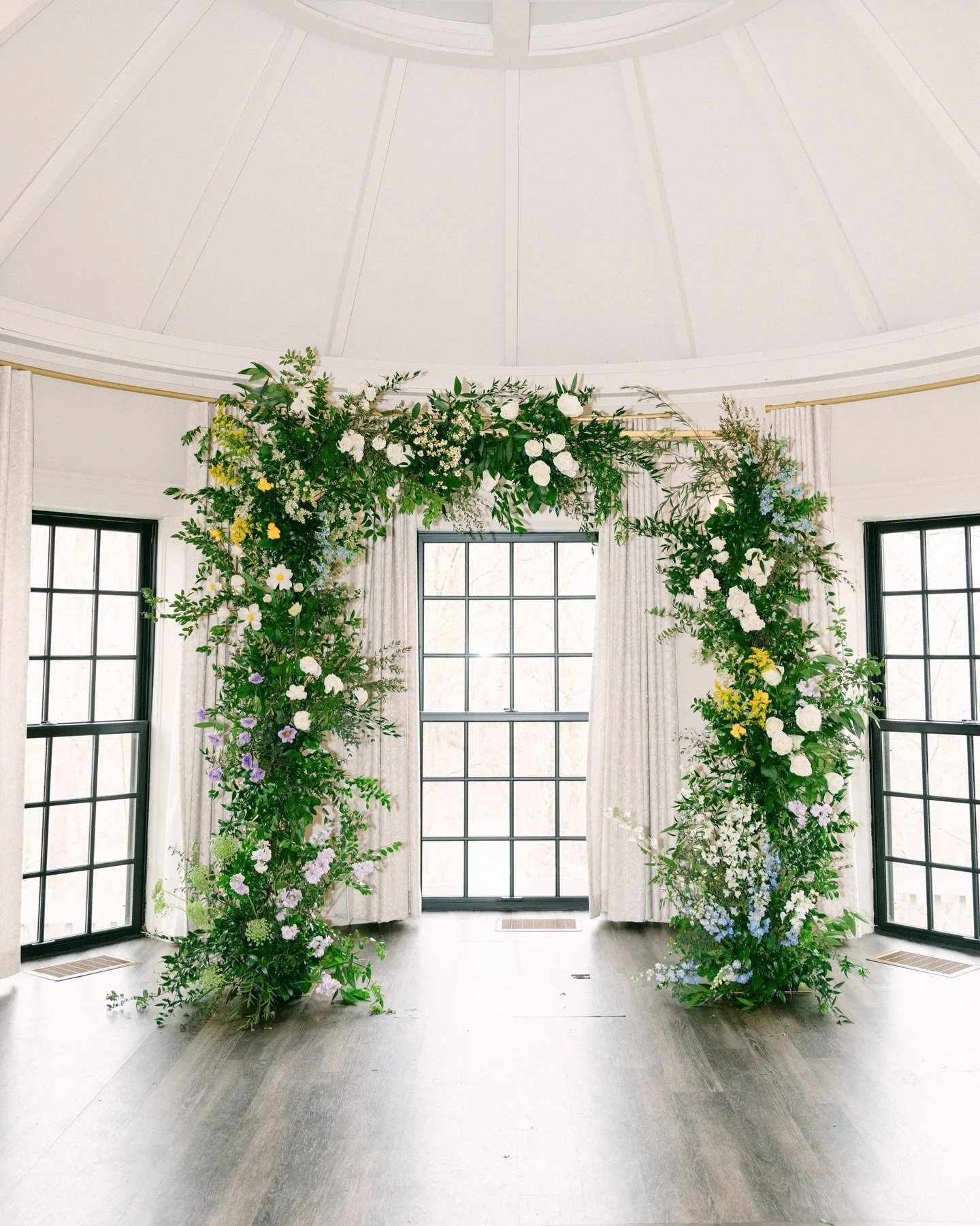 Eric and Jina&rsquo;s wedding had florals that completely took over the space, in the best way possible.

Their ceremony arch was so massive and lush that after the ceremony, we had to work with the florist to disassemble it to move it into the recep