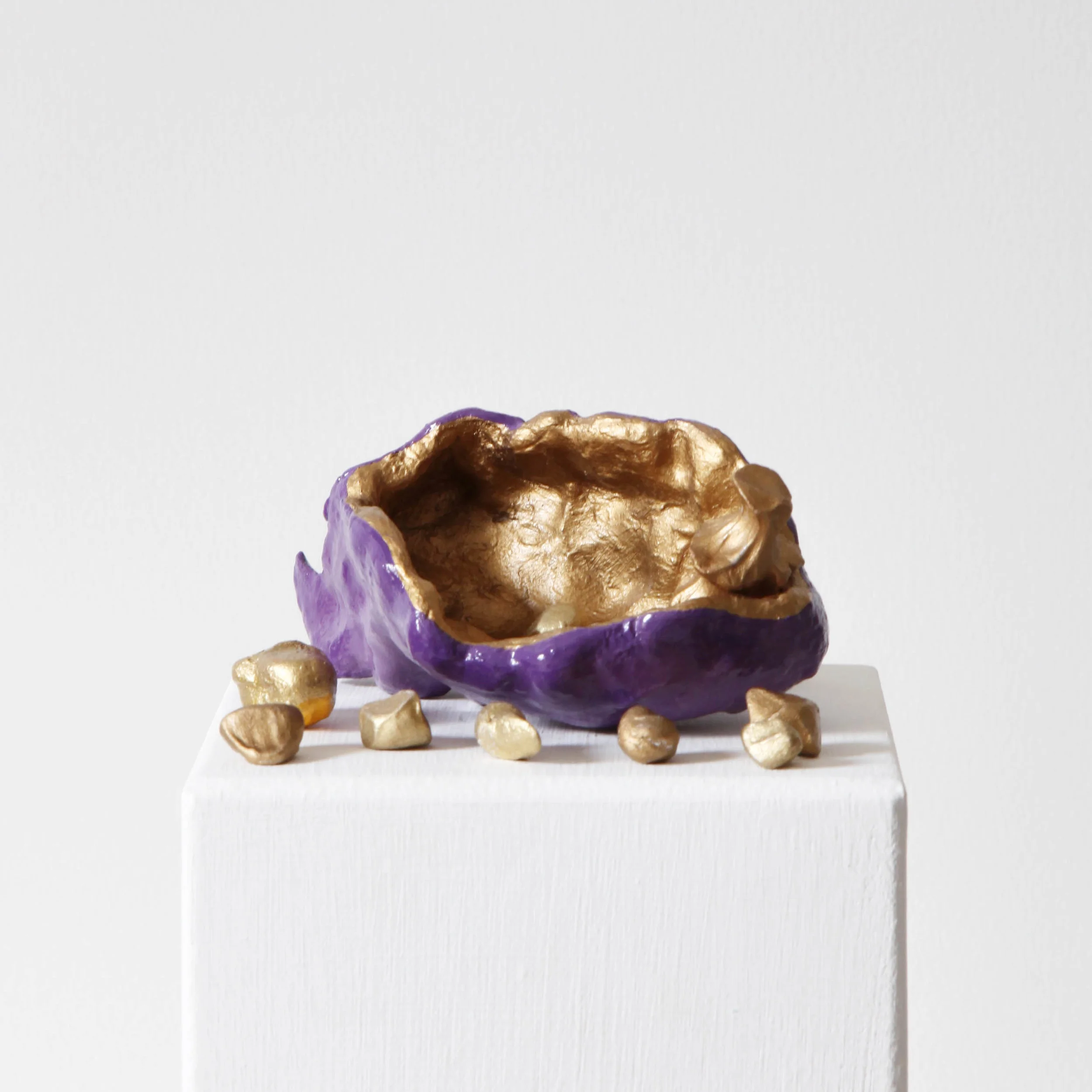 Ovary-shaped bowl and eggs , 2017, raw clay painted with acrylic and gold, lacquered and varnished, 7,5x13x7,5cm