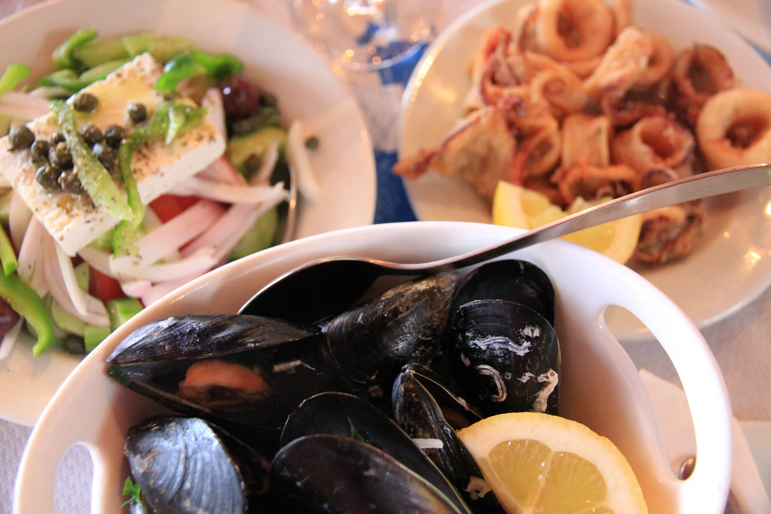 Amazing mussels and squid matched with a Greek salad - loaded with healthy fats and full of goodness