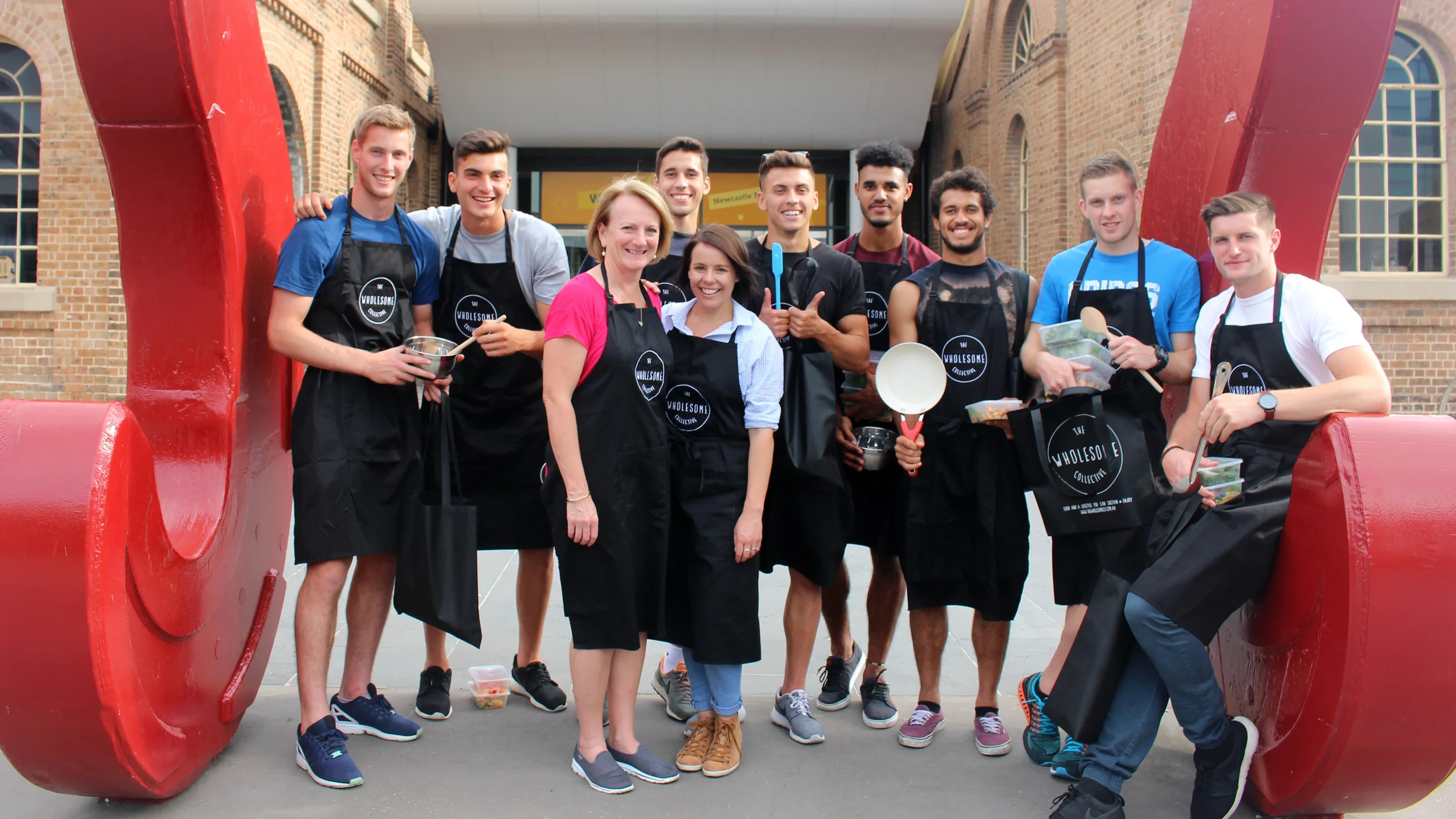 The young boys from the Newcastle Jets FC following an interactive nutrition and cooking presentation