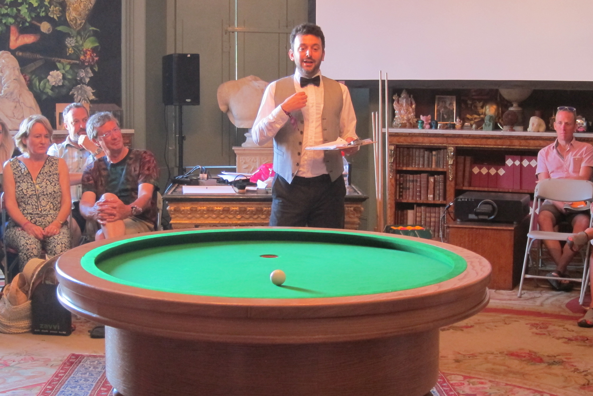 I introduced the table with a short explanation of the ellipse from Apollonius to today, demonstrating the unique geometry of LOOP and setting out the rules. Many in the audience were grateful that in addition to seeing the launch of a new sport they were given a maths lesson too. Picture: Alex Bellos.