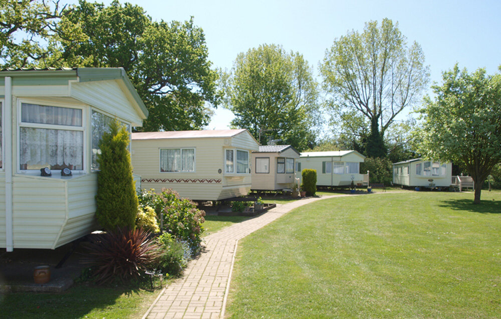 Caravans and grass at Saddlebrook Chase Caravan Park.jpg