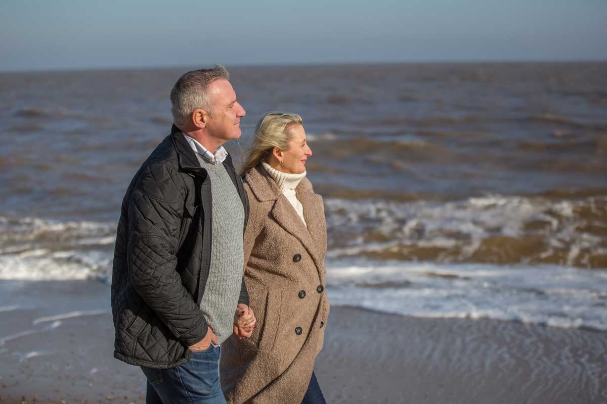 Couple by the sea on Suffolk coast.jpg