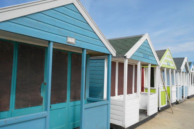 Colourful beach huts in on Southwold seafront.jpg