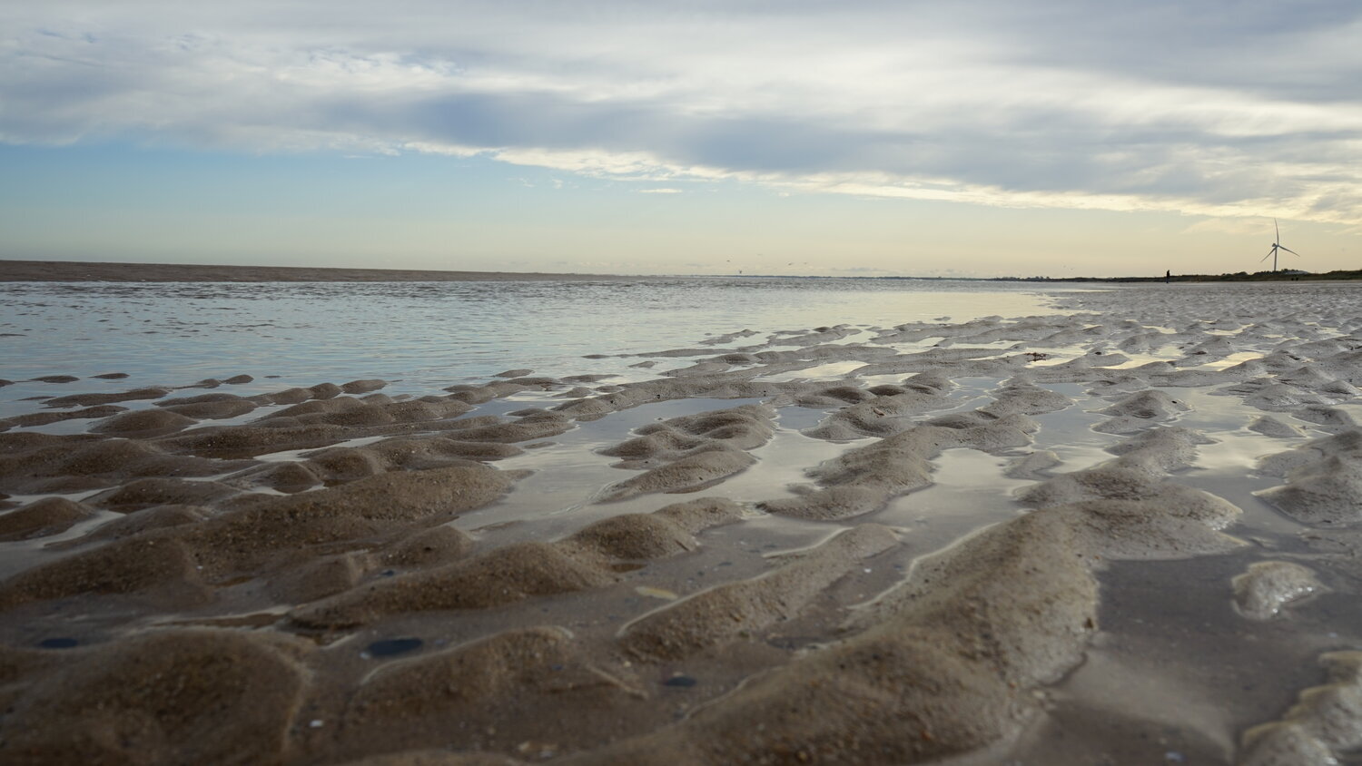 Beach and dark skies at Bridlington Beach.jpeg