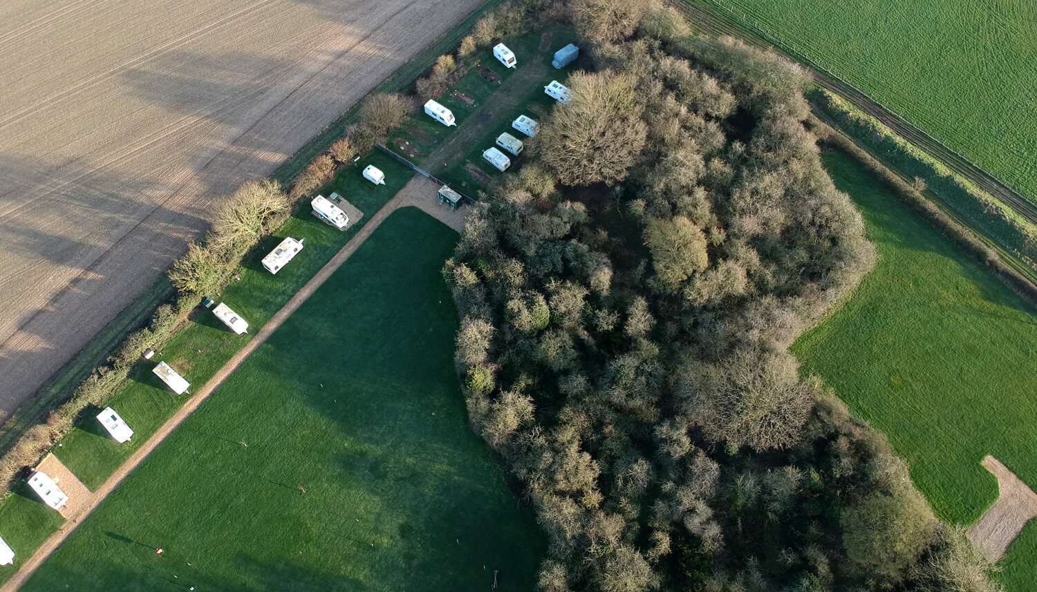 Aerial view of row of caravans at Brick Kiln park.jpg