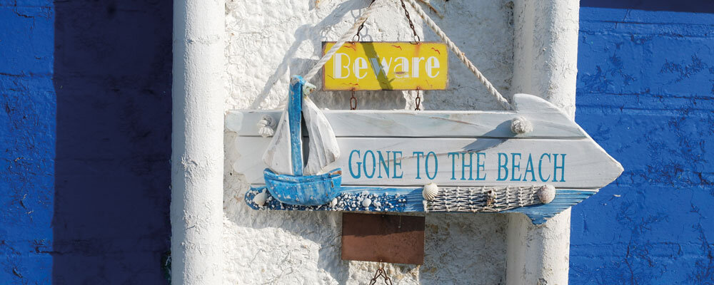 Gone to the beach sign on home.jpg