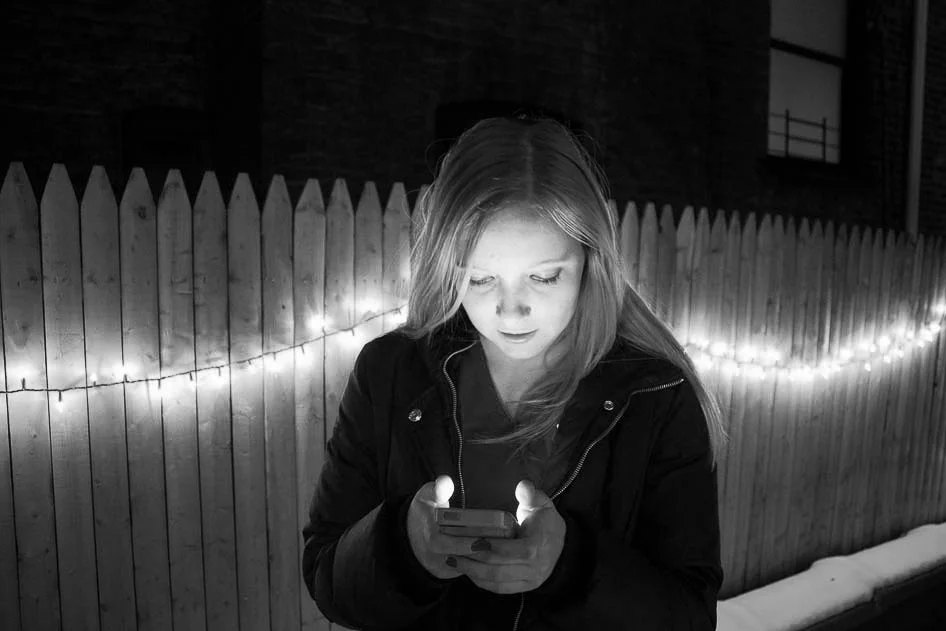 Informs Checking her work email on a Friday night.