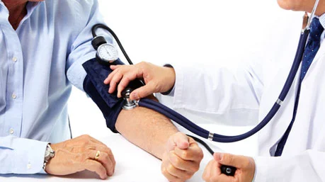 primary care doctor performing a medical exam
