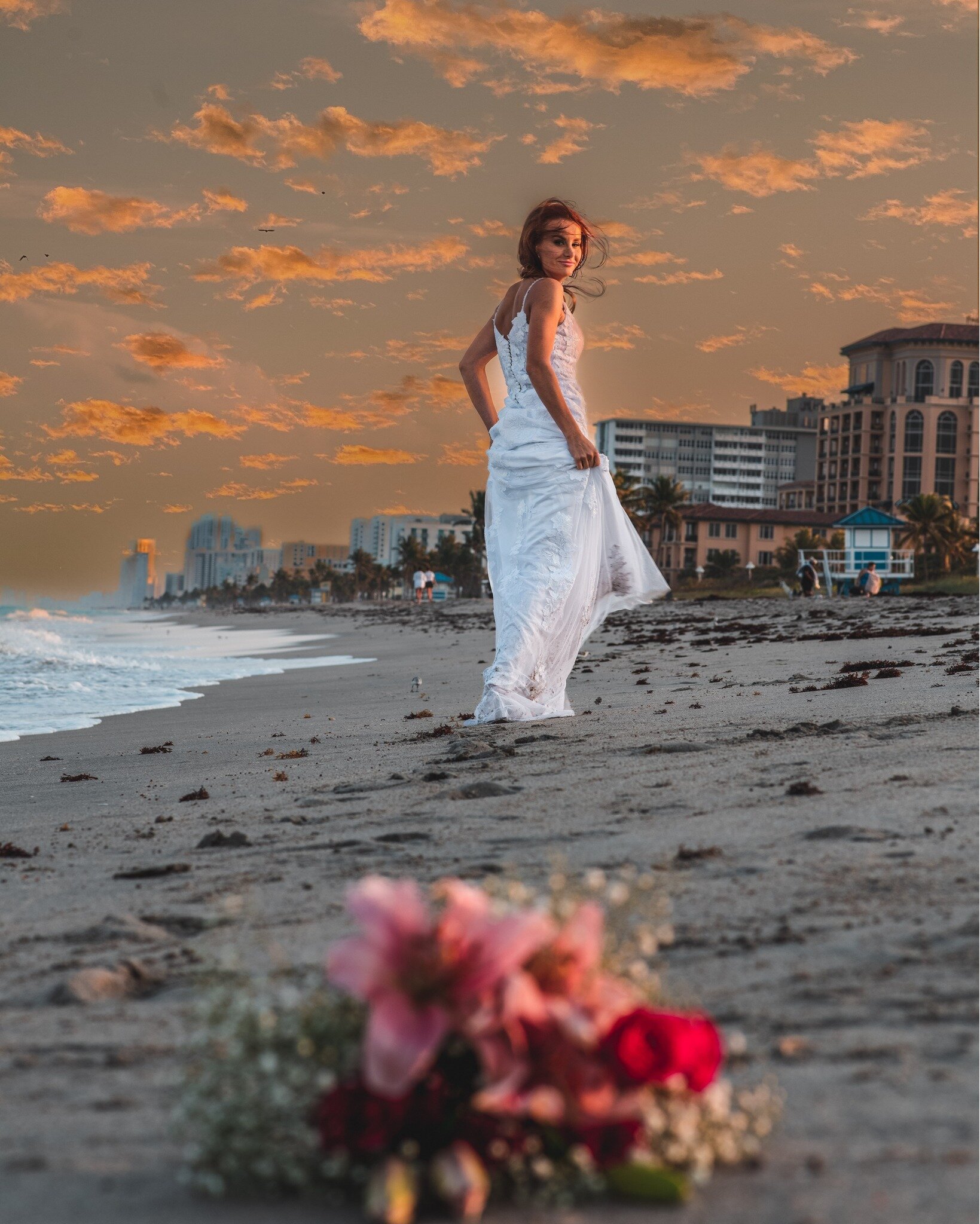 &quot;#BeachWedding&quot; by Melissa B.
Orange and yellow blossoms
carried in her hands
were watered by happy tears
barefoot in the sand

Tear filled eyes upon his bride
simple slip-like dress
his heart filled with only her
unaware of guests

@junebr